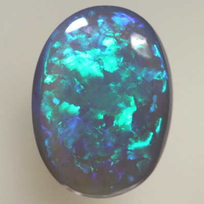 SOLID BLACK CRYSTAL OPAL 8 x 6 mm Crispy bright green over purple